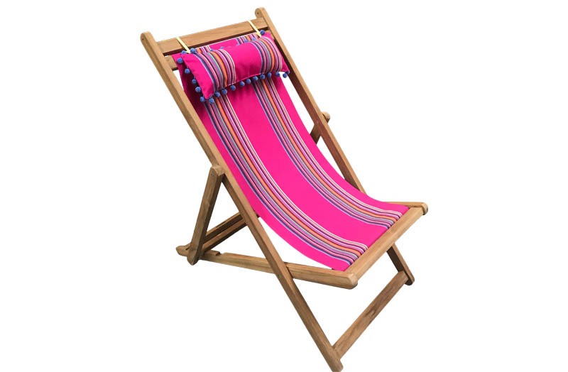 bright pink deck chair with headrest